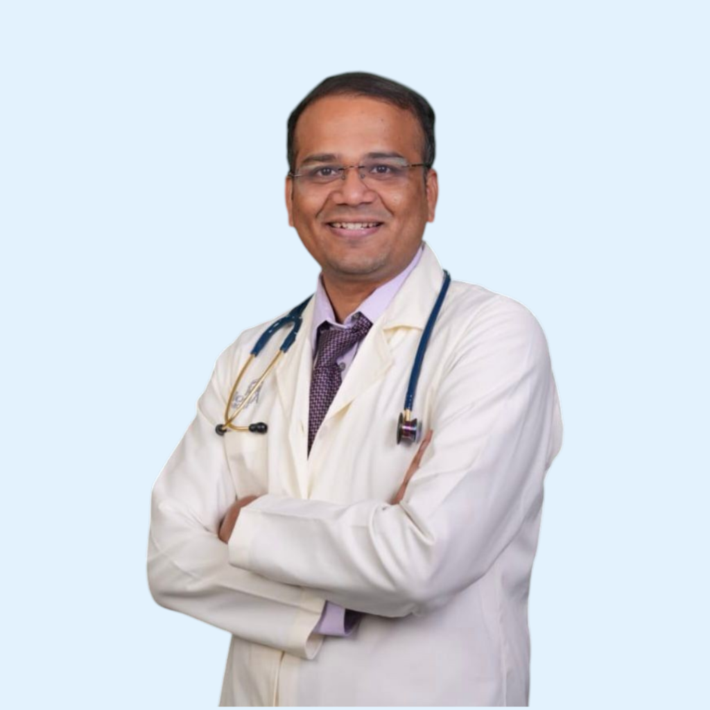 Dr. Raghupathi R with a young patient